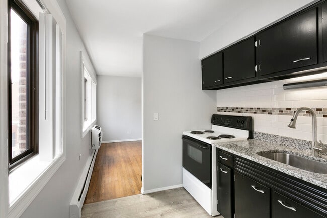 Foto del edificio - 6029 N Winthrop Ave