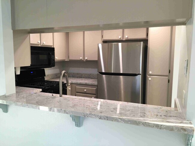 KITCHEN FROM LIVING - 761 Brookstone Rd