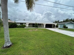 Building Photo - 6128 Cocos Dr
