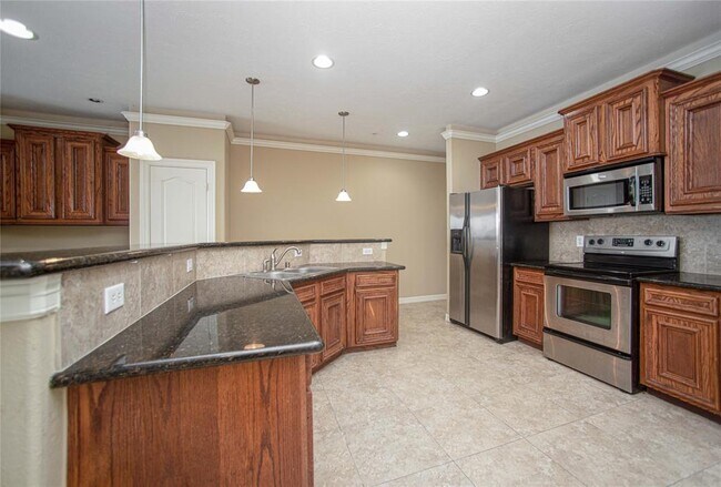 Foto del edificio - 7037 Kingston Cove Ln