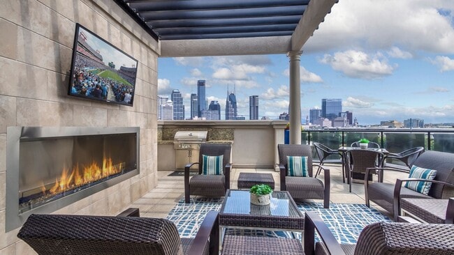 Rooftop lounge with outdoor fireplace, grill and amazing views of downtown - 2700 Charlotte Ave Apartments