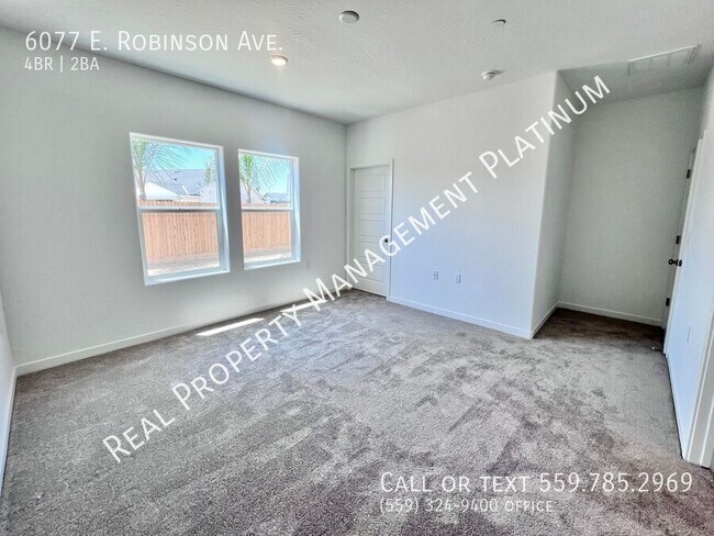 Foto del edificio - 6077 E Robinson Ave