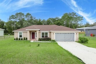 Building Photo - 7488 SW 204th Ave