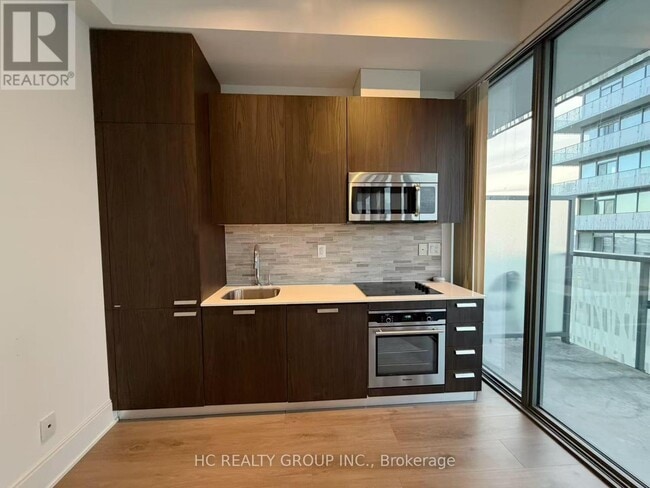 Building Photo - 50 Charles St E