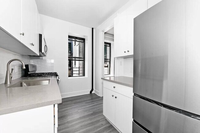 Building Photo - 34-04 34th Ave