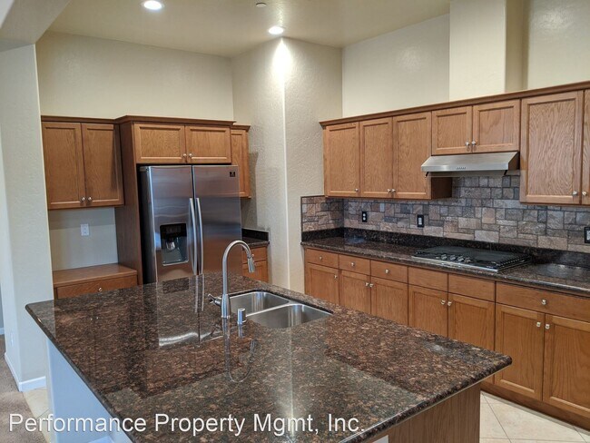 Building Photo - 4 br, 3 bath House - 7664 E. Giavanna Ave