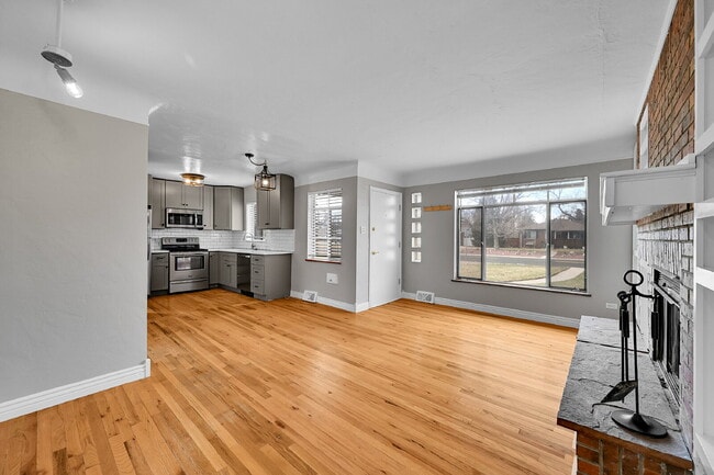 Building Photo - $2,440.95, 3 bed, 1 bath located in Denver with a newly renovated kitchen and In Unit Laundry!