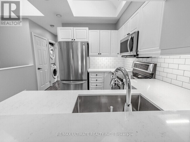 Photo du bâtiment - 213 Langley Ave