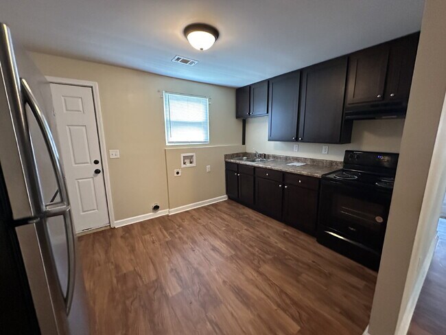 Building Photo - Section 8 Welcome! Charming 2-Bed Duplex i...