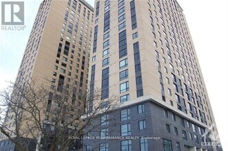Building Photo - 105-105 Champagne Ave S