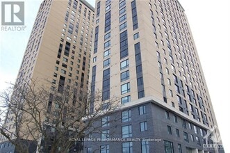 Building Photo - 105-105 Champagne Ave S
