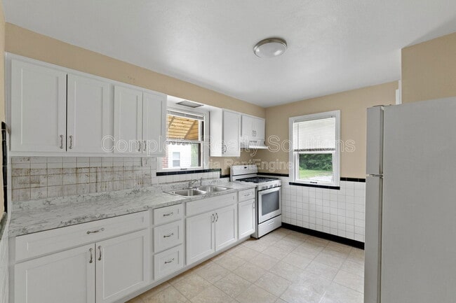 Building Photo - 7125 Theodore Ave