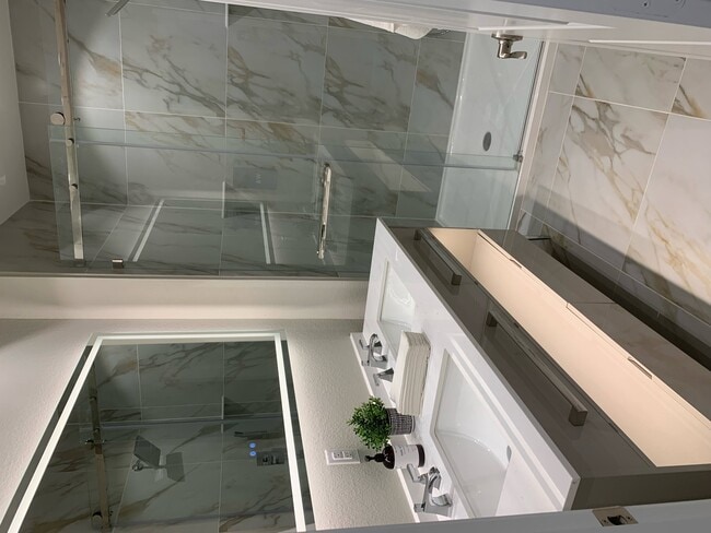 Dual Vanity Bathroom with Lighted Mirror - The Reserve at Red Oak