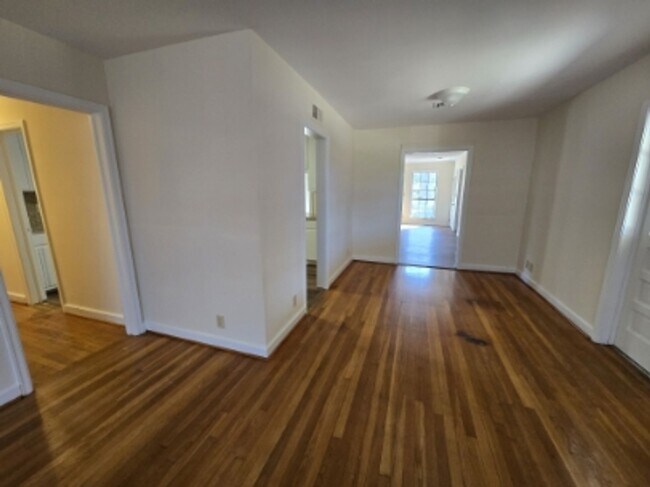 Building Photo - Den and Living Room and No Carpet Anywhere