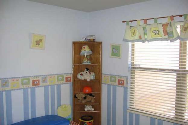 Building Photo - 15667 W Port Au Prince Ln
