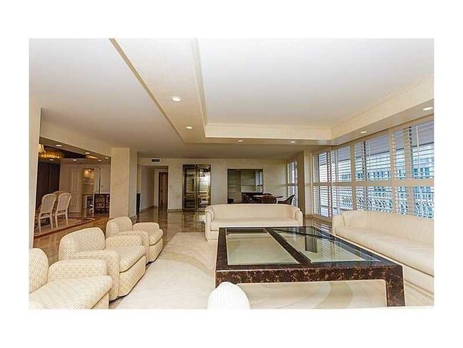 Building Photo - 10155 Collins Ave