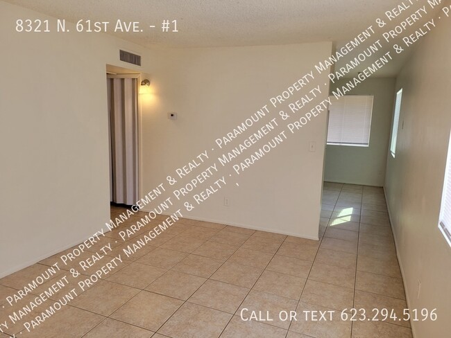 Building Photo - 8321 N 61st Ave