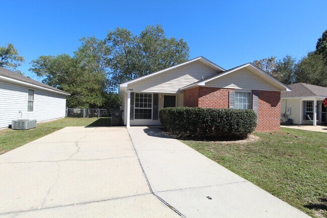 Building Photo - Well-Maintained 3BR Home in Bay Pine Villa Near NAS Pensacola with Open Layout & Private Backyard