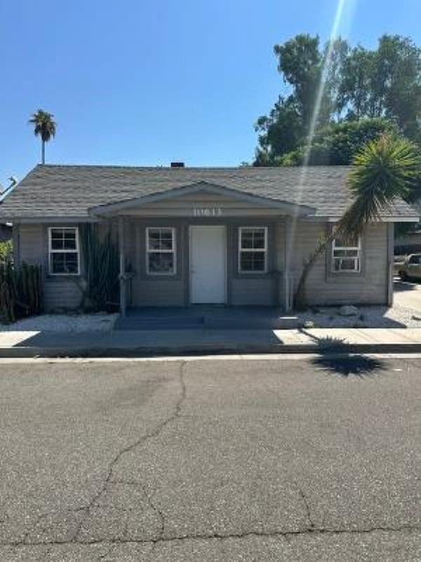 Building Photo - 10613 Lind Ave