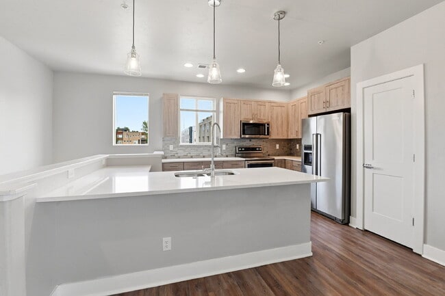 Building Photo - $2,890.95, 2-bed, 2.5-bath, located in Denver with a rooftop terrace.