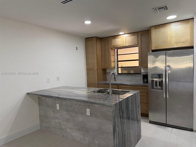Building Photo - 3877 Estepona Ave