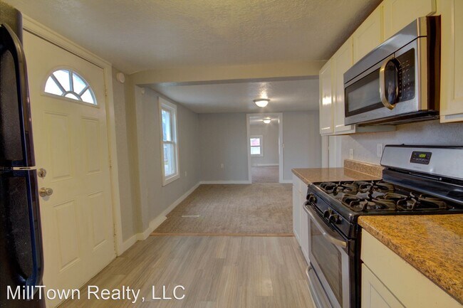 Building Photo - 2 br, 1 bath House - 1322 1/2 Morton Dr