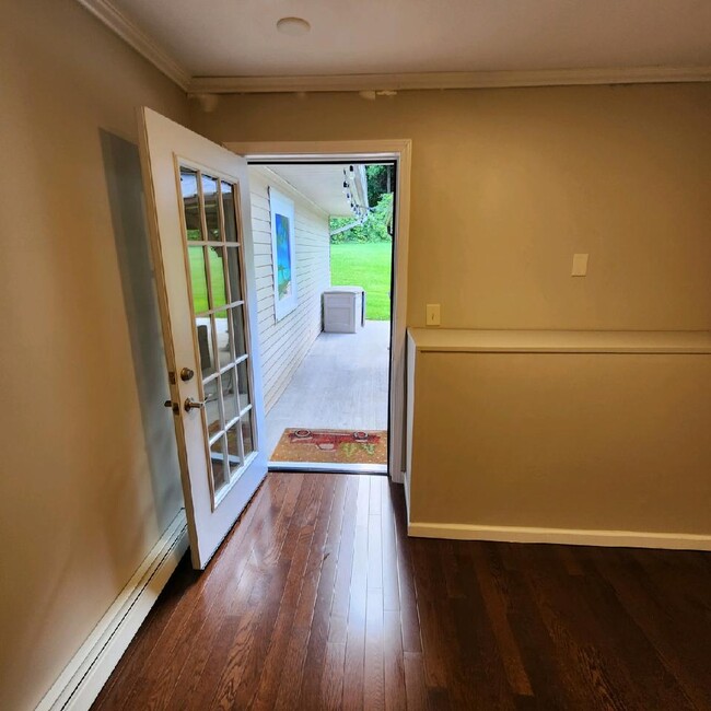 Den with door to back patio - 630 Curran Rd