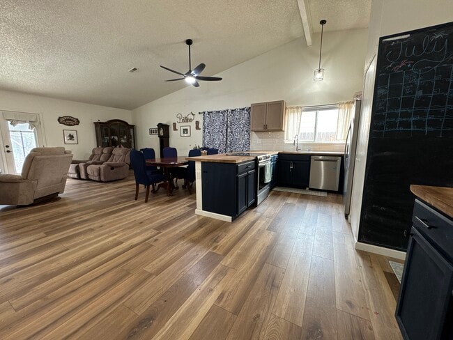 Updated Kitchen and Open concept from Kitchen Dining Area and Living Room. - 3685 Deep Haven Dr