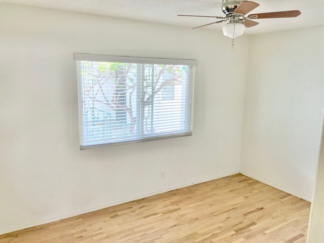 Bedroom with ceiling fan - 311 Bungalow Dr