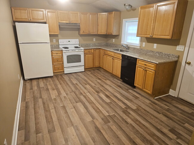 Kitchen with new floors - 60 Amherst St