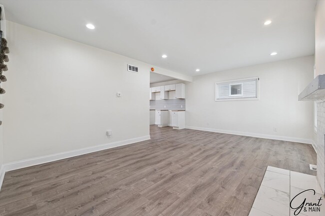 Building Photo - $1300 - Renovated 3 Bedroom