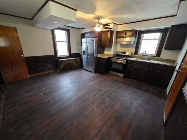 Photo - Spacious 3-Bedroom Home with Granite Countertops & Huge Eat-In Kitchen