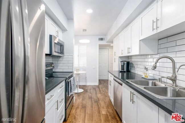 Building Photo - 3 br, 2 bath Condo - 4630 Willis Ave Unit 309