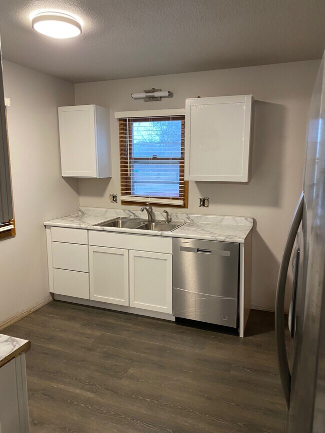 Kitchen with new cabinets and dishwasher - 4606 Valdez Drive