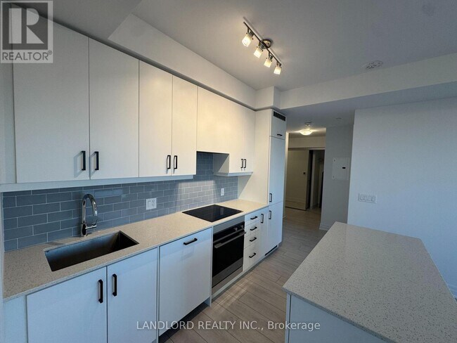 Building Photo - 30-1230 Elm Dr W