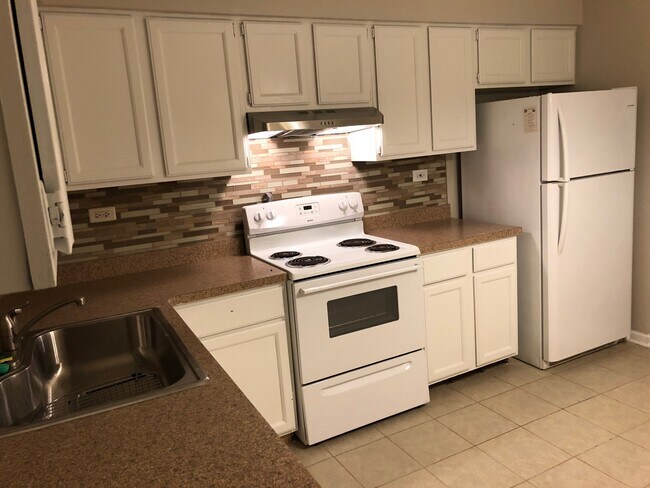 Foto del edificio - 1211 Whispering Hills Ct