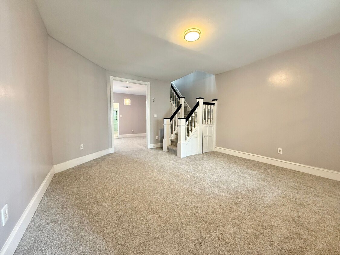 Primary Photo - Spacious 3-Bedroom Home with Porches in Co...