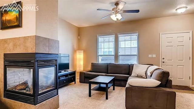 gas fireplace in living room with new LVP flooring - 3549 Bay Owl Grv