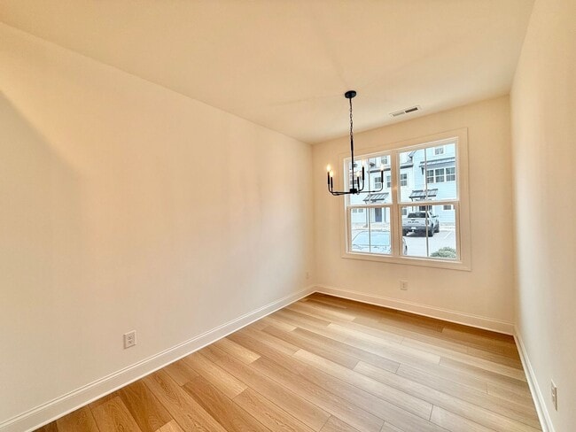 Building Photo - **OFFERING 1/2 OFF FIRST MONTH'S RENT** Newly Built 4BD, 3.5BA End-Unit Raleigh Townhome in a Gre...