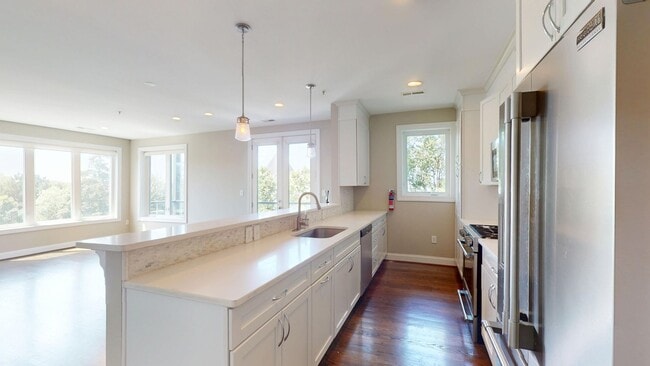 Building Photo - Stunning Three Bedroom Penthouse Condo W/Three Private Outdoor Spaces & Parking Included!