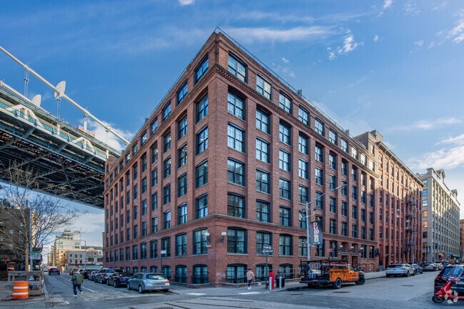 Mid-rise brick buildings can be found throughout DUMBO, NY.