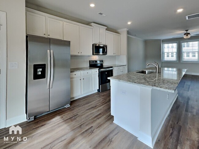 Building Photo - 6933 Woodland Stream Pl