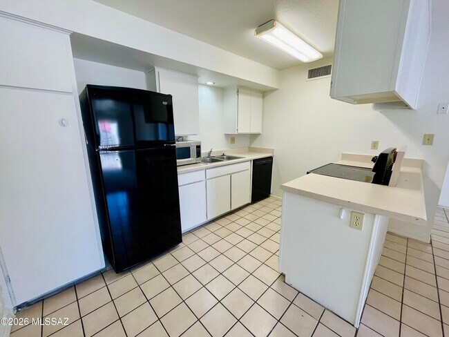 Foto del edificio - 3216 N Cherry Ave