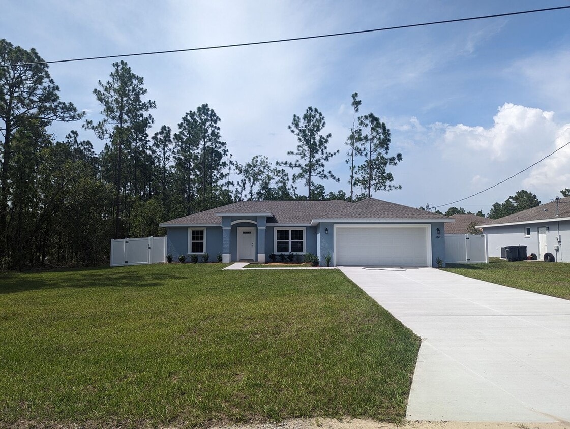 Primary Photo - New 3/2/2 fenced home with Many Upgrades i...