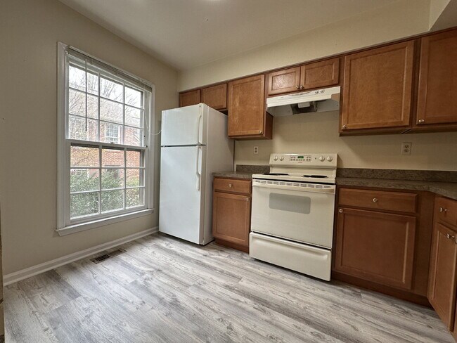 Building Photo - Refined Townhome Living: Avon Model with M...