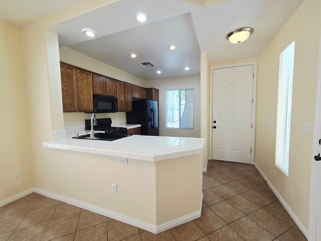 Building Photo - 8295 Golden Flowers St