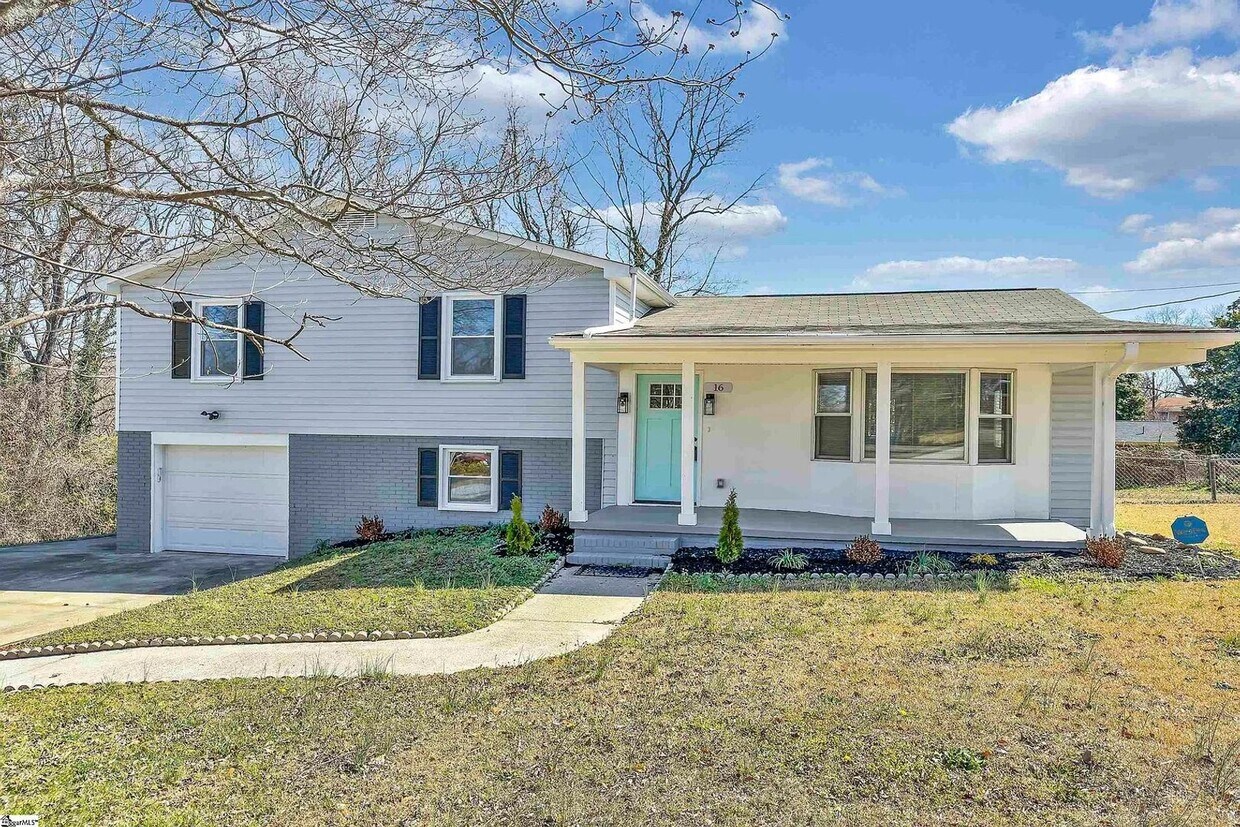 Primary Photo - A 4-bedroom GEM!!