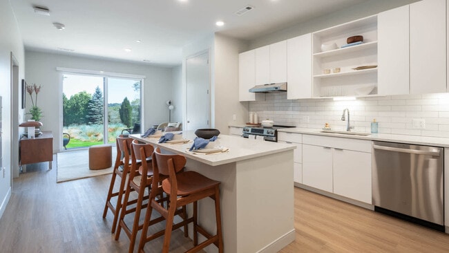 Kitchen with Stainless Steel Appliances - The Basin