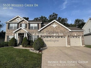 Building Photo - 5530 Wooded Creek Dr