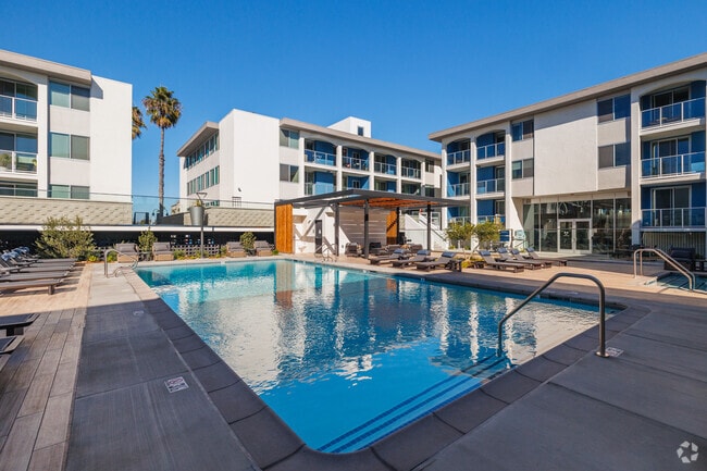 Poolside view - Dolphin Marina Apartments